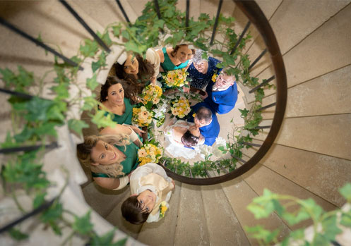 Vintage Aston Martin's at wedding.